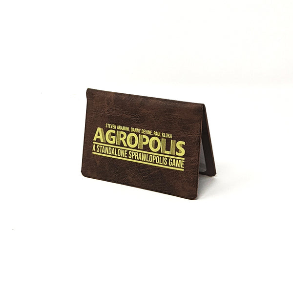Agropolis standing up, looking similar to a small wallet